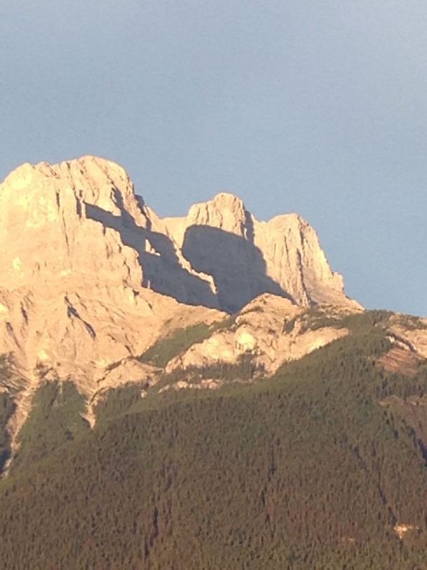 The Shadow On This Cliff Near Canmore, Alberta Looks Like A Guy Using A Telescope