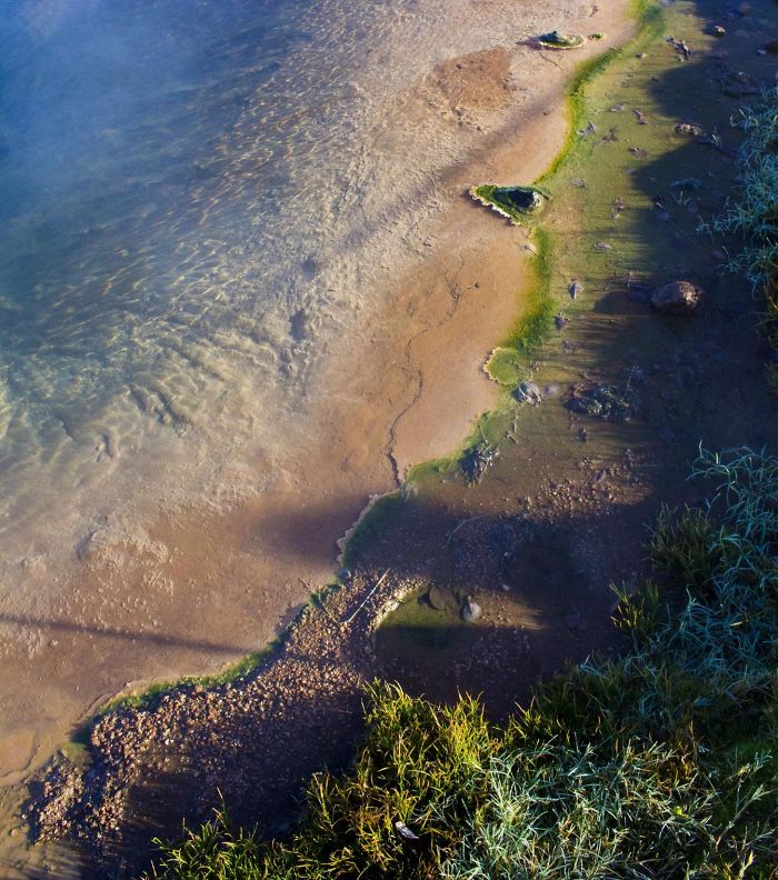 I Took A Picture Of This Puddle In Geysir National Park In Iceland, And It Looks Like An Aerial View Of A Beach