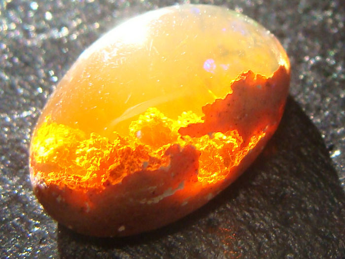 This Opal Looks Like A Sunset In The Clouds