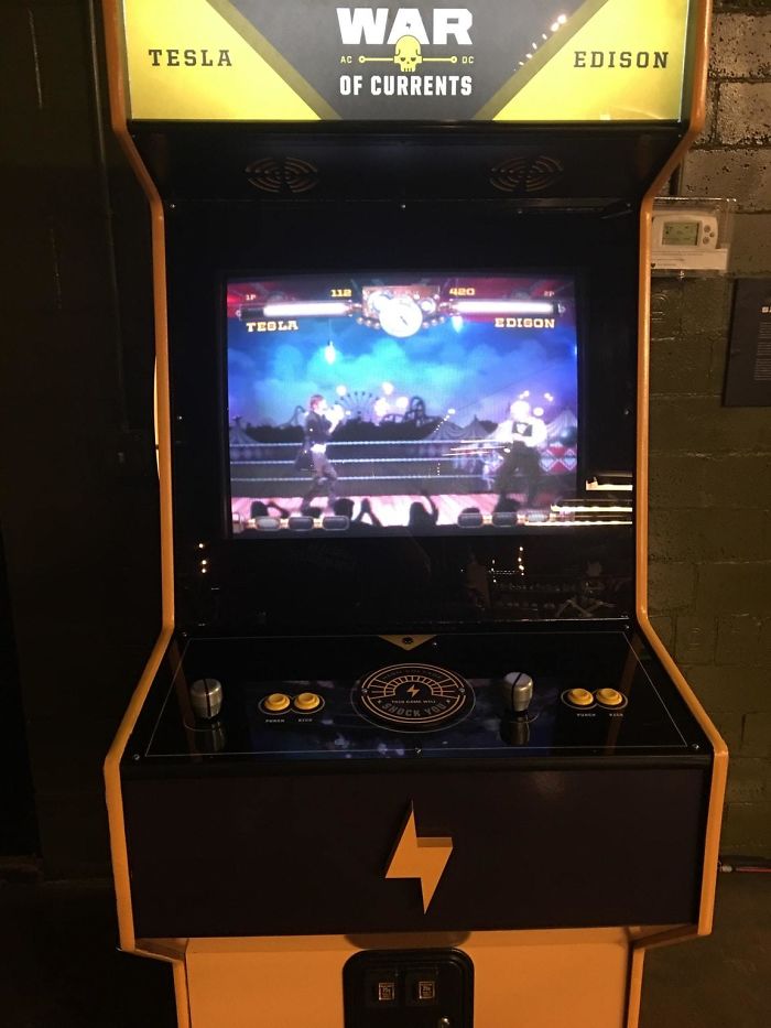 Bar I'm At Has A Tesla Vs Edison Fighting Arcade Game. Loser Gets Shocked
