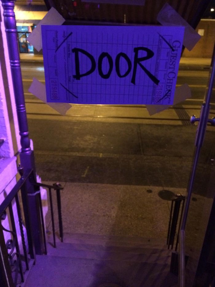 The Glass Door At This Bar Has Had So Many Drunk People Walk Into It They Had To Put Up A Sign