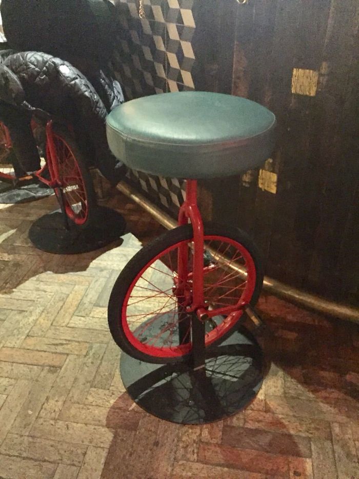 These Bar Stools Are Made To Look Like Unicycles