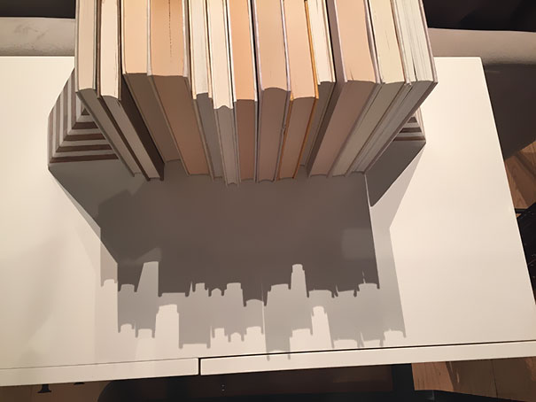 The Shadow From These Books Look Like A City Skyline