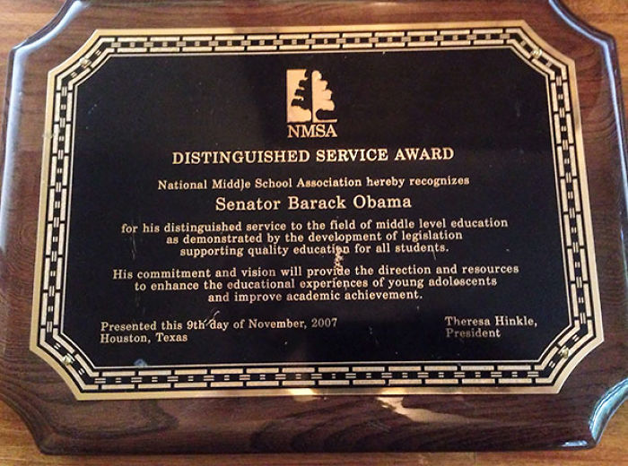 Distinguished Service Award plaque found at a thrift store recognizing a senator for contributions to education.