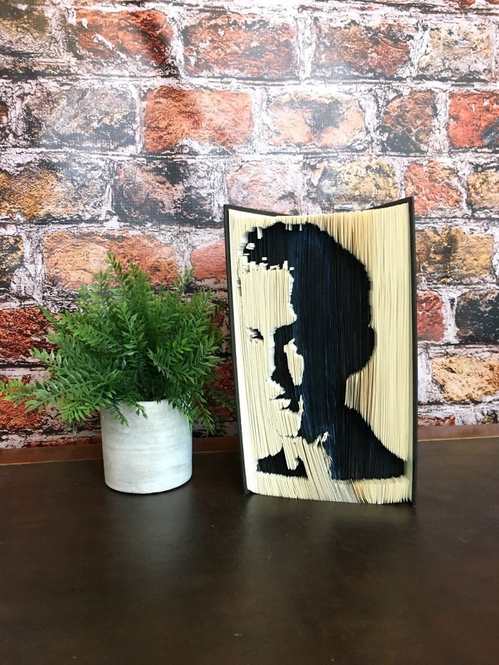 I Fold Books Into Works Of Art