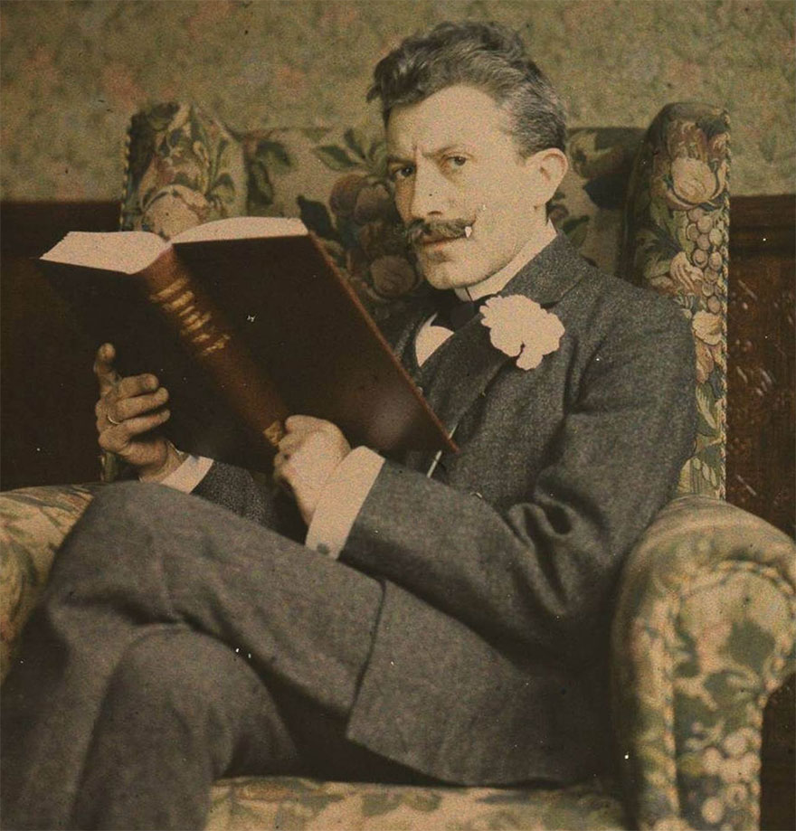 Man With Book Sitting In Chair, 1915