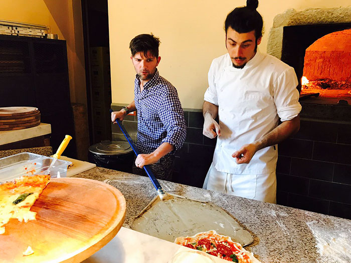 "Parks & Rec" Star Adam Scott Hilariously Fails At Pizza Class In Italy, Chef Saves Him In The Most Brilliant Way