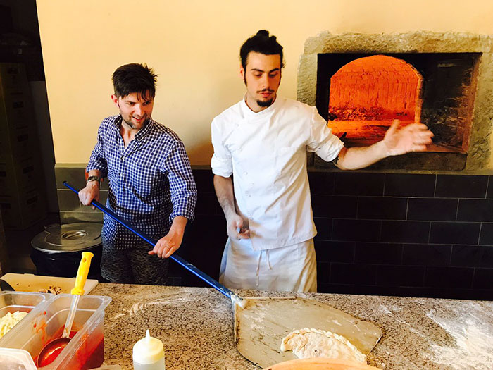 "Parks & Rec" Star Adam Scott Hilariously Fails At Pizza Class In Italy, Chef Saves Him In The Most Brilliant Way