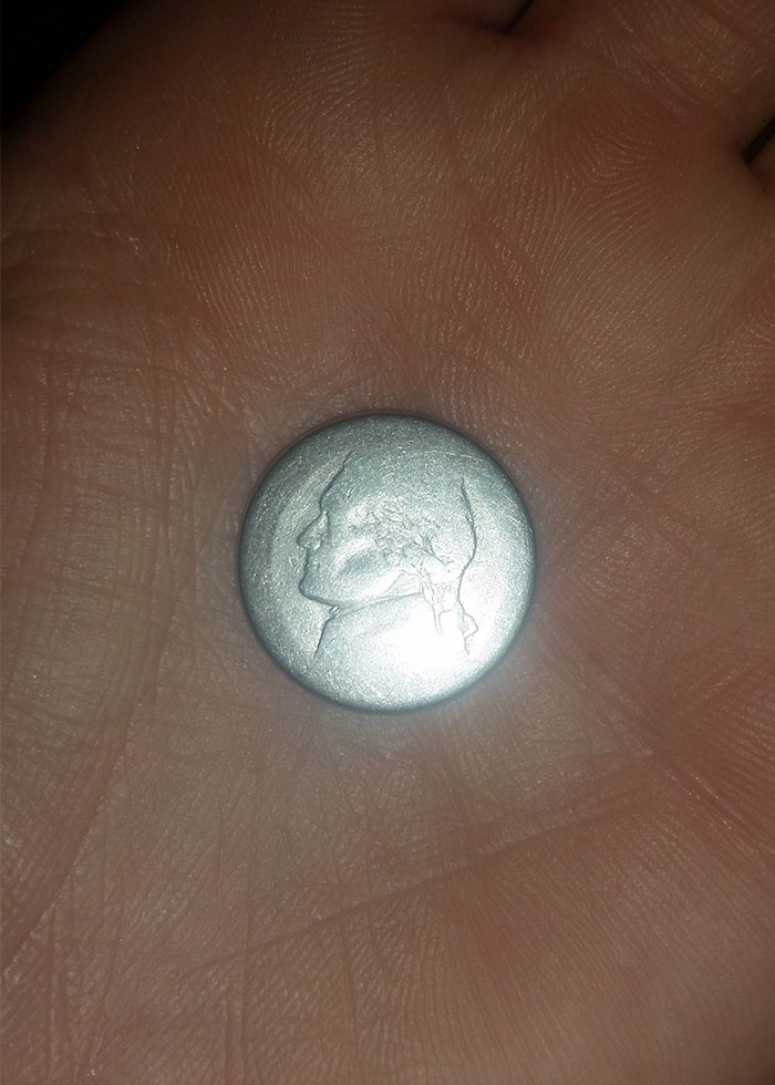 This Nickel Has Been Almost Completely Worn Down Over Time