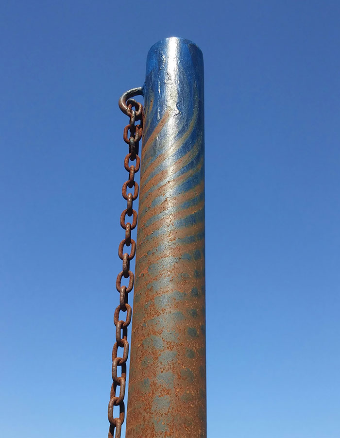 The Wear Marks On This Tetherball Pole