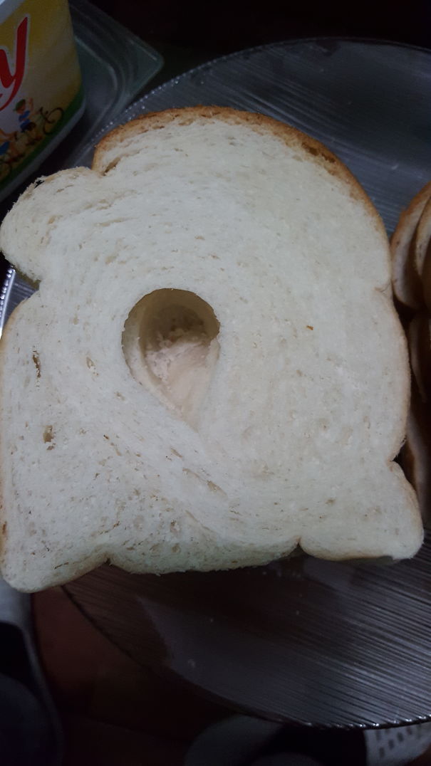 Seems Like The Baker Got Hungry... Raindrop Cut Out Through This Loaf Of Bread Lol