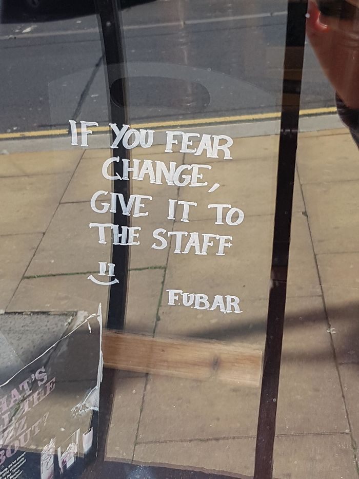 This Sign On A Pub's Window
