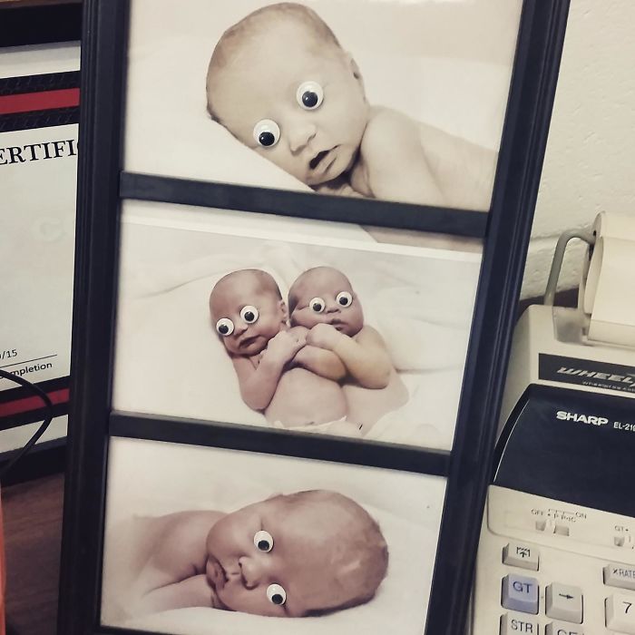 I Took My Googly Eyes To Work And Decorated My Coworker's Photos On His Desk