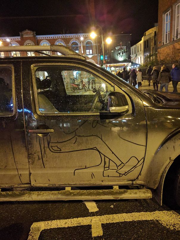 Someone Drew The Drivers' Legs In The Dirt On This Car