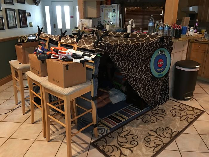 Kid Forts Have Come A Long Way... This One Has A Weapons Cache, A Fan, Carpet, Furniture, Interior Lighting And Wall Art.