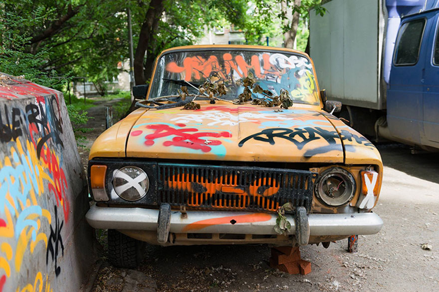 Russian Street Artists Delete Car In Real World Using Clever Optical Illusion