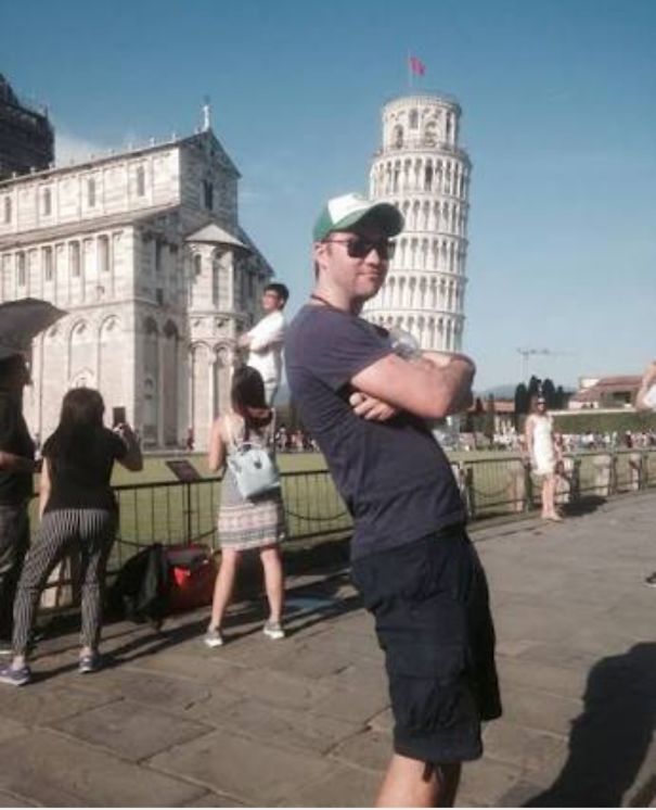 Guy Trolling Other Tourists Near The Pisa Tower