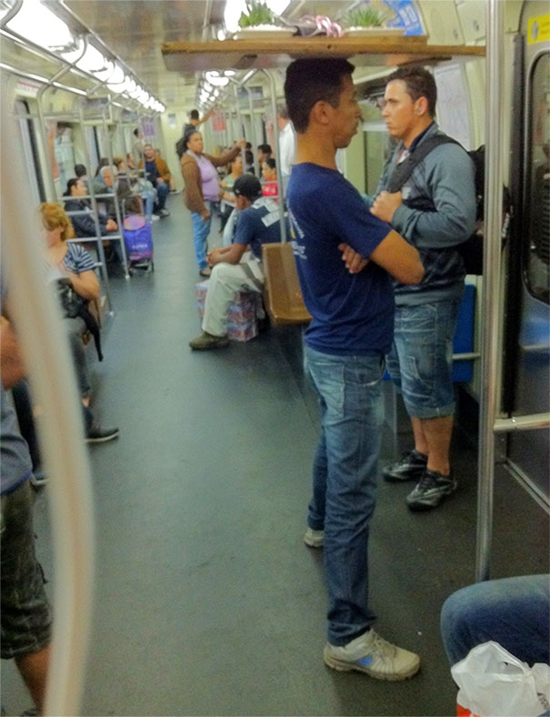 A Guy On The Subway Balancing Two Vase Plants On His Head Because Of Reasons