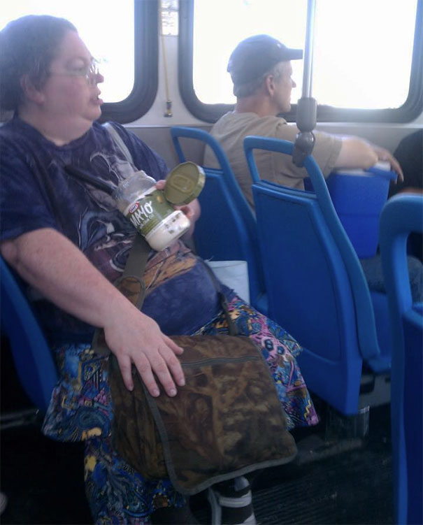 Woman On Bus Eating Tub Of Mayonnaise