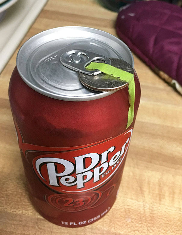 Got A Soda Out Of A Vending Machine, And There Is A Quarter Taped To The Top