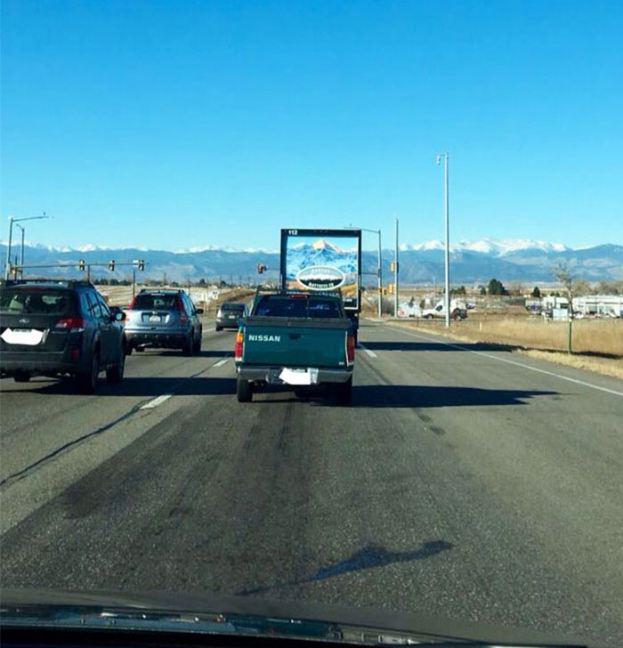 Truck Lines Up With Rocky Mountains