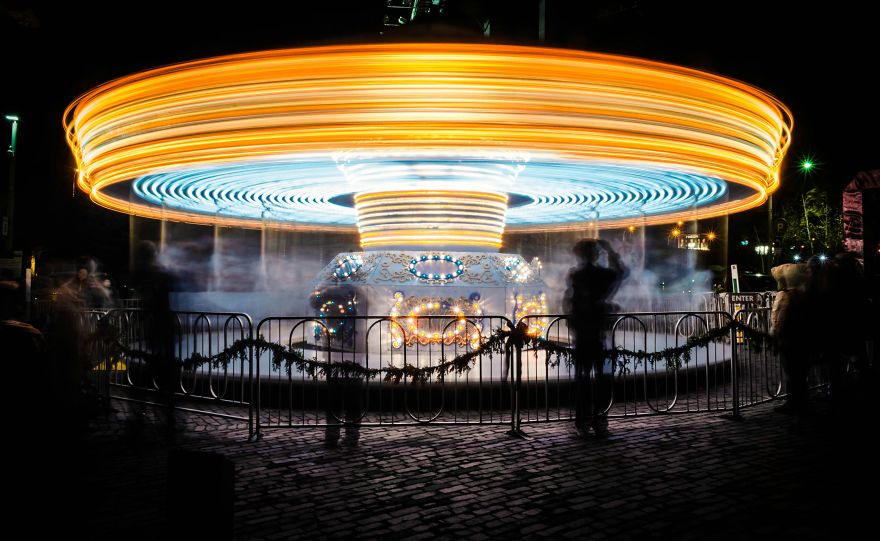 Long Exposure Shot Of A Carousel At Night