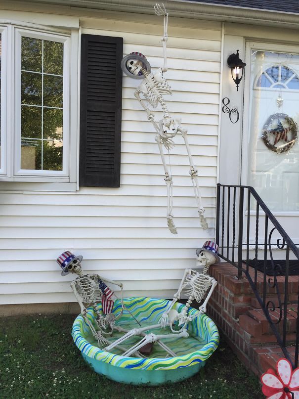 My Neighbors Didn’t Take Down Their Halloween Decorations, But They've Been Adjusting Them For Each Holiday