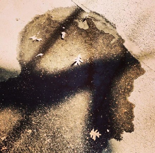 This Puddle Looks Like A Man Opening His Mouth