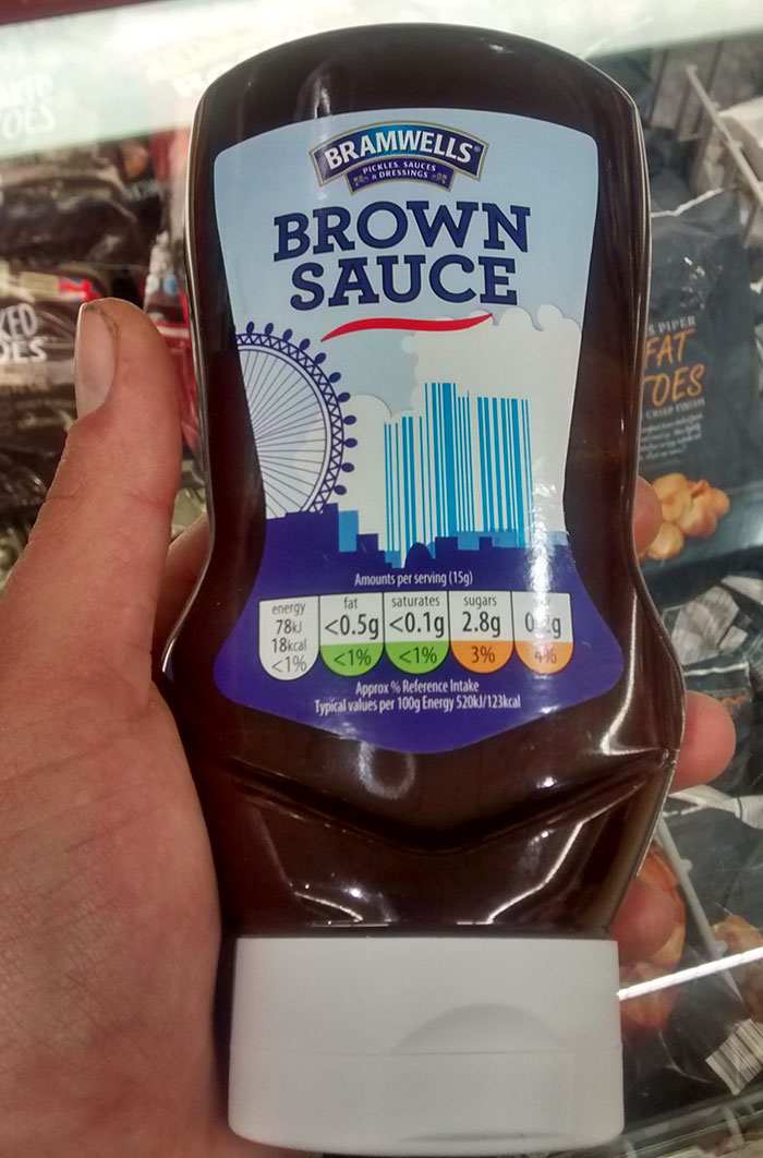 The Barcode On Thos Brown Sauce Is Integrated Into The Skyline