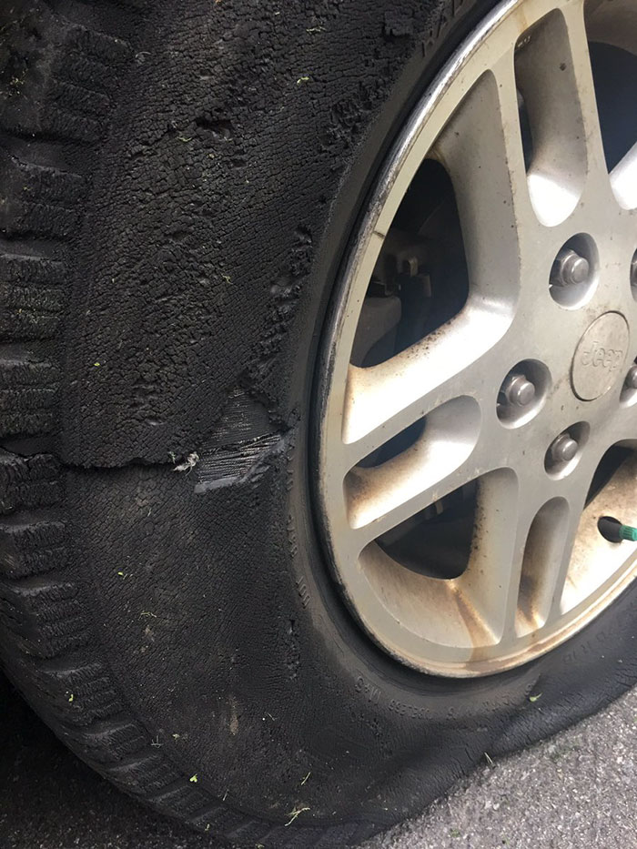 Woman Posts Pics Of Her 'Slashed Tire' On Twitter, But Someone Quickly Proves She's Lying And It's Hilarious