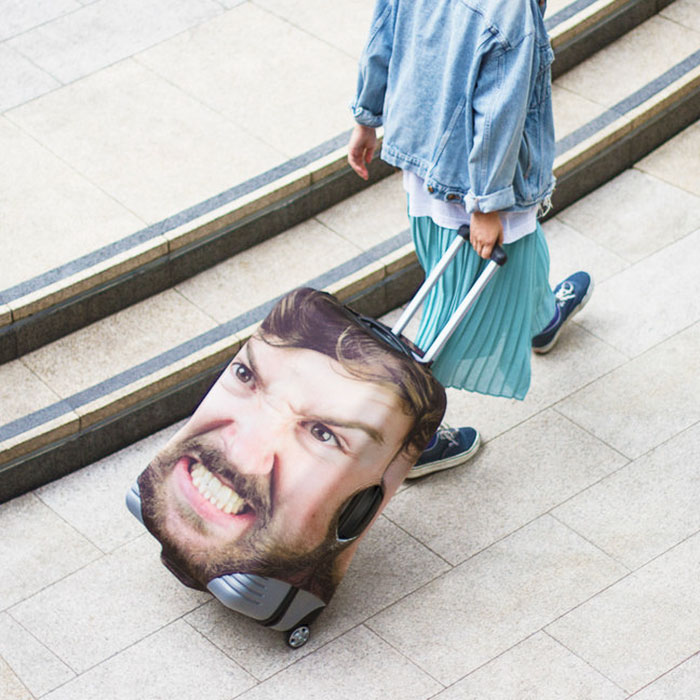 People Are Laughing At This Luggage Cover That Uses Giant Pic Of Your Face But It's Actually Genius