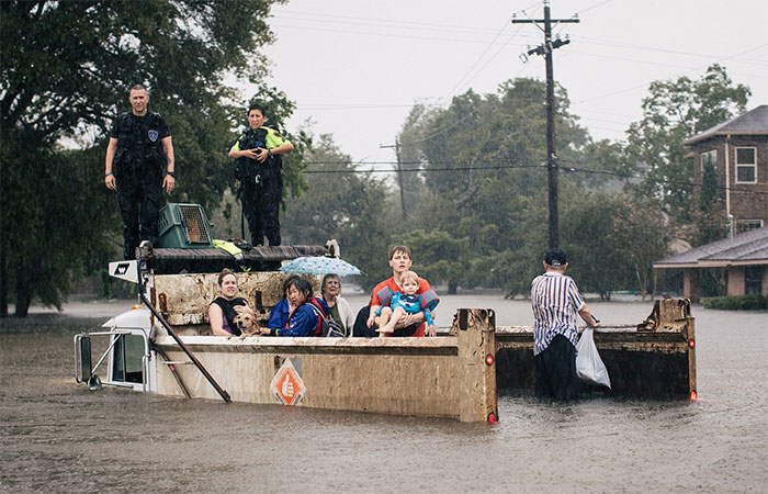 Rescue Workers And Civilians Waited For Emergency Crews In The Meyerland Area Of Houston