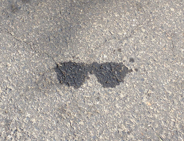 This Oil Stain Looks Like Sunglasses