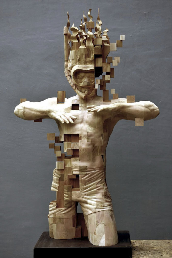 These Pixelated Sculptures That Look Like Computer Glitches Are Actually Made From Wood