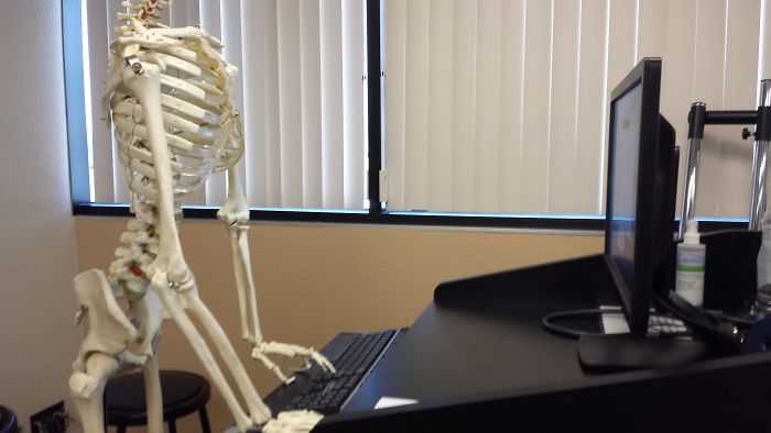 Waiting For Adobe Cc To Update In A Room With A Skeleton