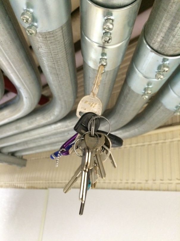 Friend Tried To Toss Me His Keys At Work, They Got Stuck On Piping In The Roof Like This