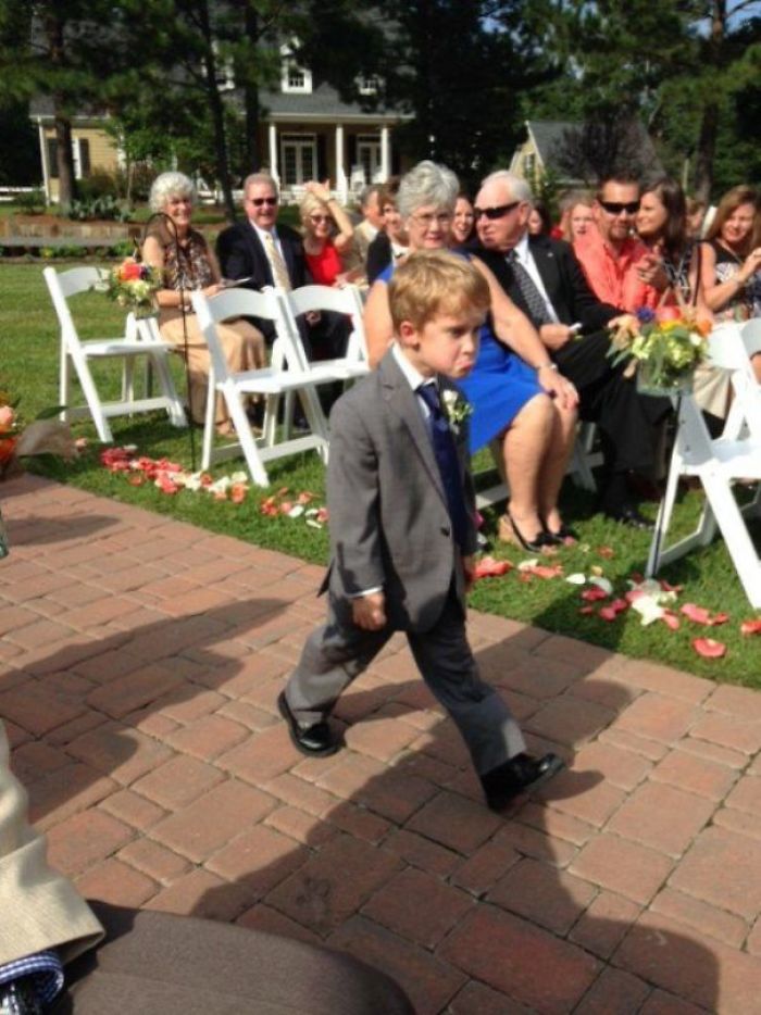 This Kid Really Doesn't Like Weddings