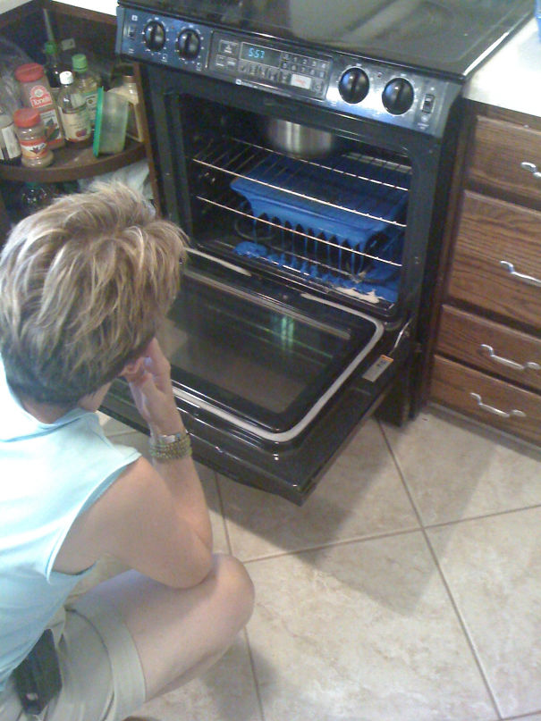 Pizza You Say? Here's My Mother-In-Law Preheating A Cutting Board