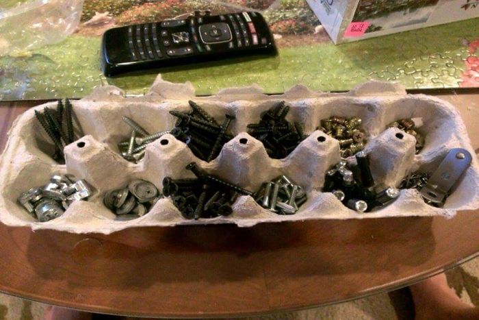 Use An Old Egg Carton To Separate Hardware Out Before Building Furniture From A Kit