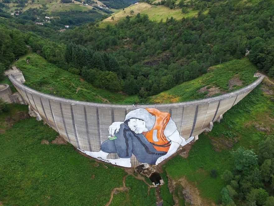 Artists Made A Mural On An Abandoned Dam To Represent Refugees In France