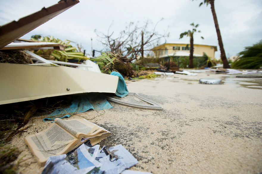 Damaged Books And Debris Is Sprawled Throughout The Streets Of Marigot, Saint Martin