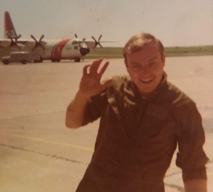 My Dad Goofing Around On The Tarmac In Front Of The C130 He Crewed In The Uscg In The 70s.