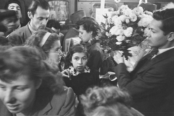 Man Carrying Flowers On A Crowded Subway, 1946