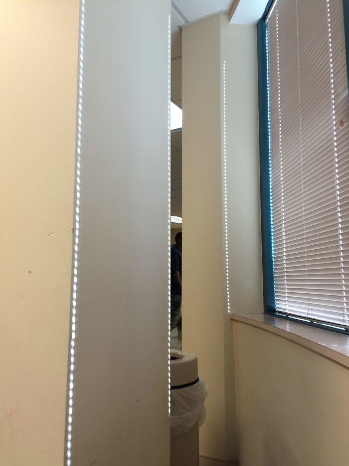 The Light Coming Through These Blinds Perfectly Lined This Column