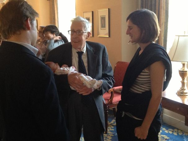 My Grandfather, At My Grandmother's Funeral, Holding His Great-Granddaughter For The First Time