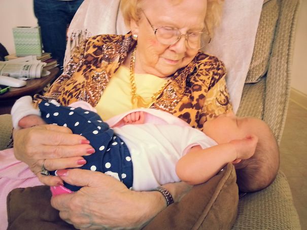 Great-Great-Grandma Holding Great-Great-Granddaughter For The First Time