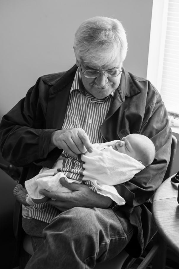 Grandfather Meeting His Newborn Grandson