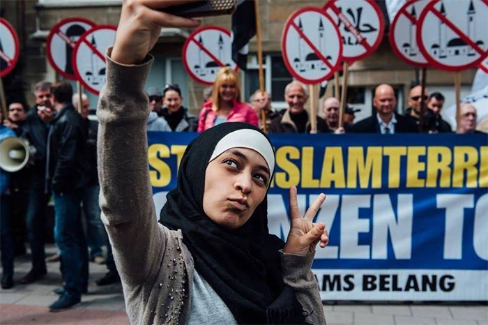 Zakia Belkhiri Takes A Selfie At An Anti-Muslim Demonstration In Antwerp, Belgium 2016
