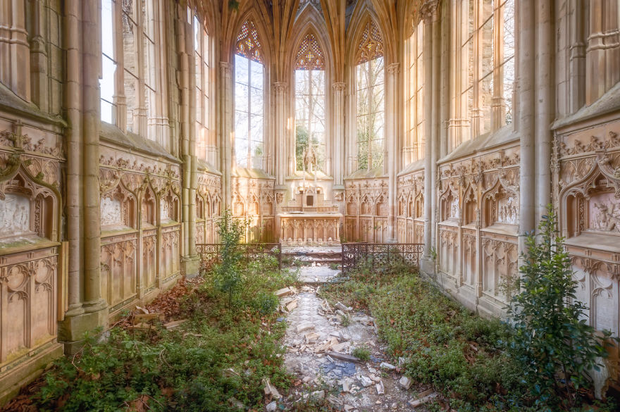 Abandoned Chapel With Plants On The Floor