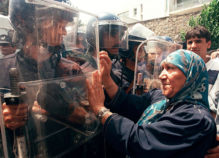 A Woman Gestures To Riot Policemen During A Protest Organized By The Rally For Culture And Democracy (Rcd), Algiers, 02 July